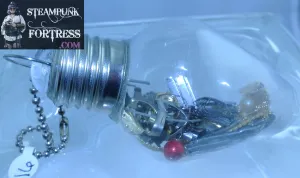 CHRISTMAS ORNAMENT LIGHTBULB LIGHT BULB #16 GOLD AUTHENTIC GENUINE WATCH CLOCK BANDS RED WHITE VINTAGE PEARLS GEARS GOLD SNOWFLAKES MINIMALIST STARR WILDE STEAMPUNK FORTRESS