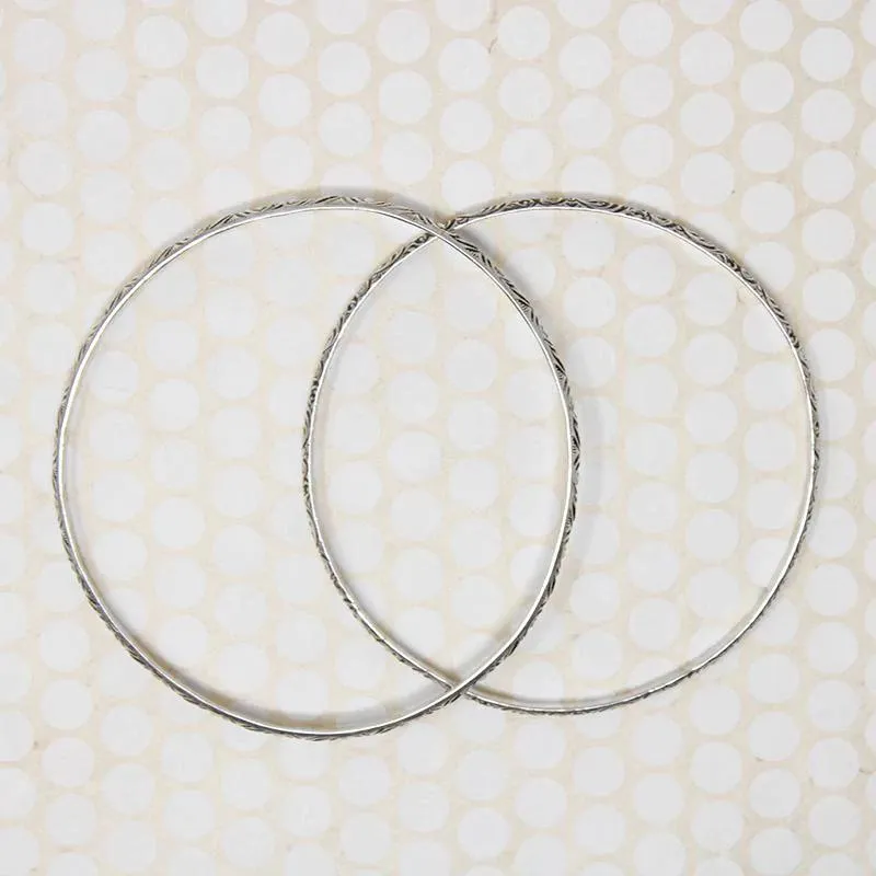 Pair of Slim Engraved Silver Bangles