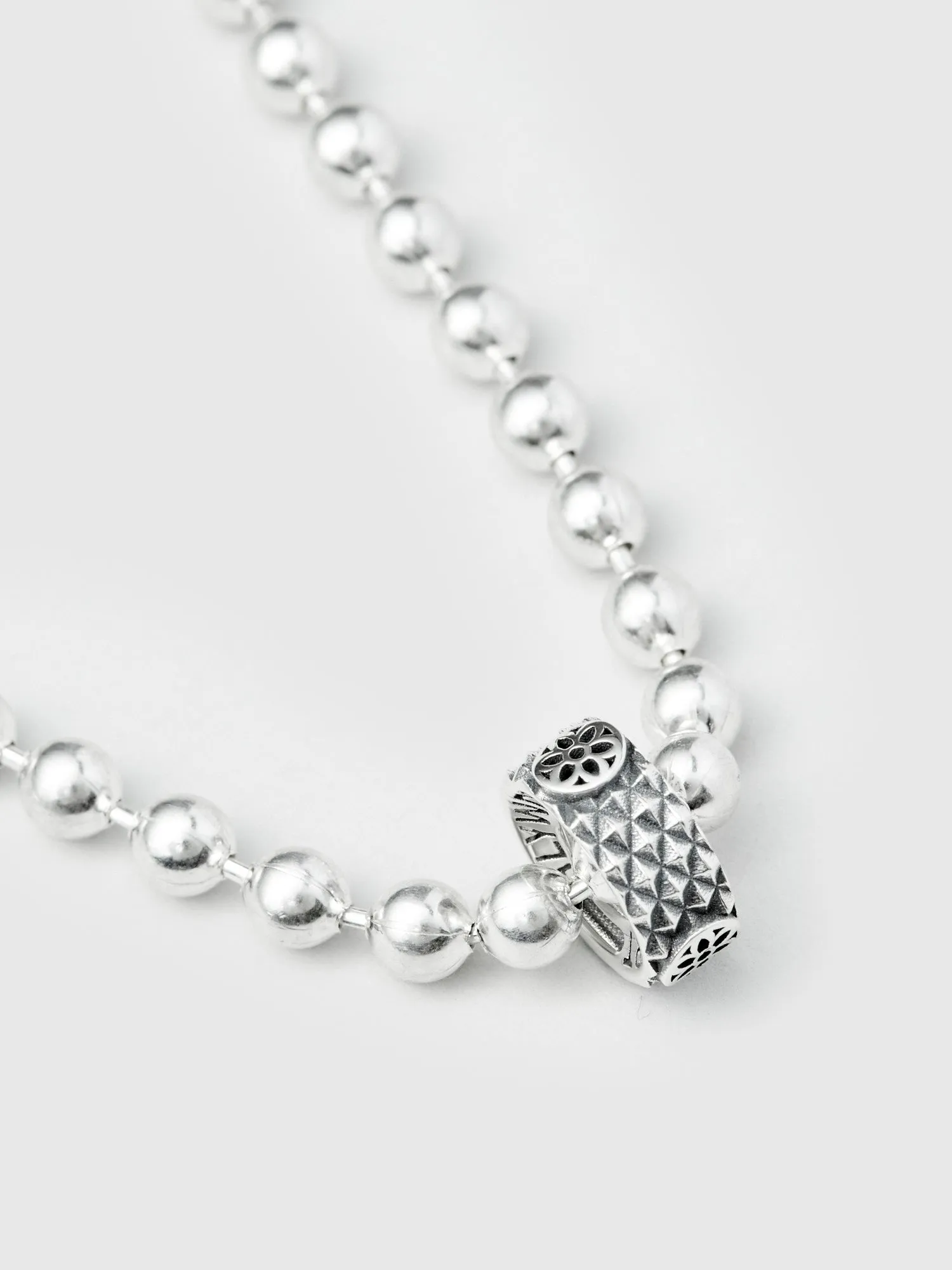 Rosette Rondel in Sterling Silver