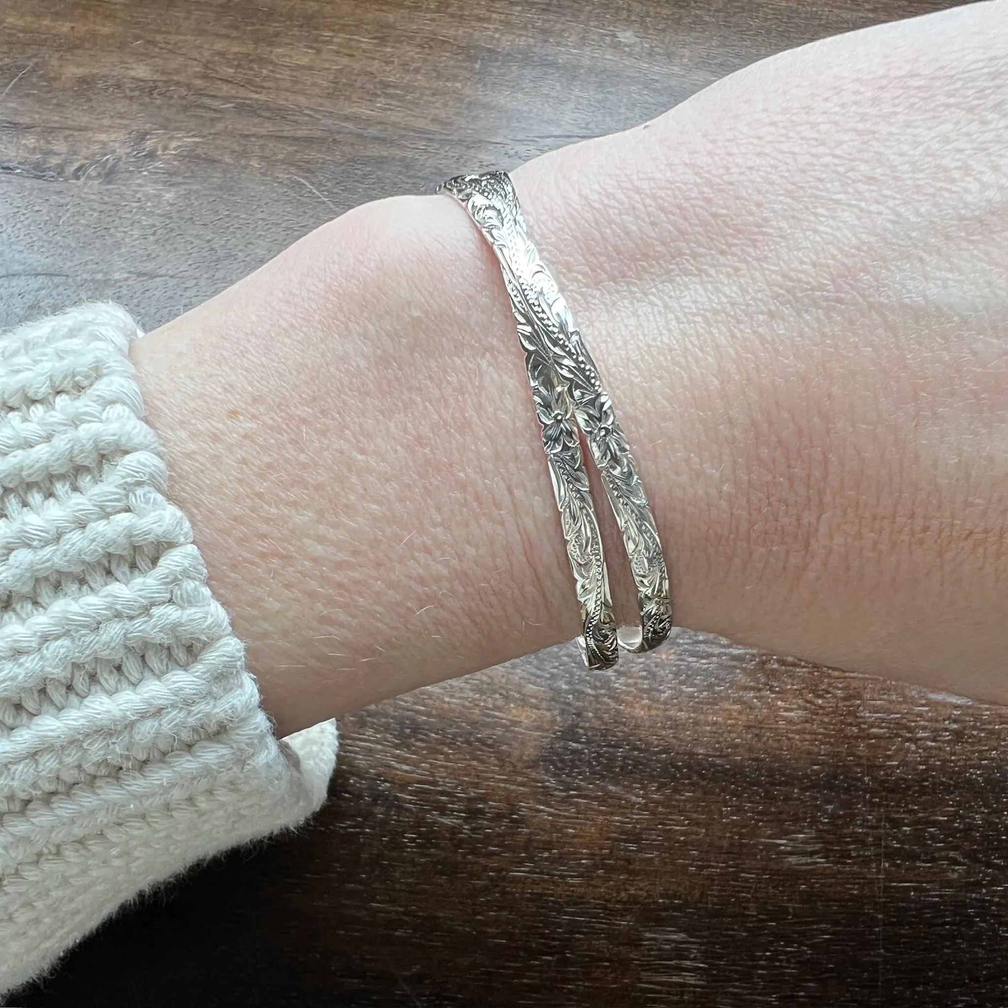 Two Slim Sterling Bangles with Hawaiian Pua Kala Flowers