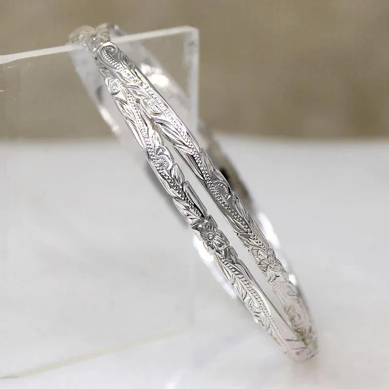 Two Slim Sterling Bangles with Hawaiian Pua Kala Flowers