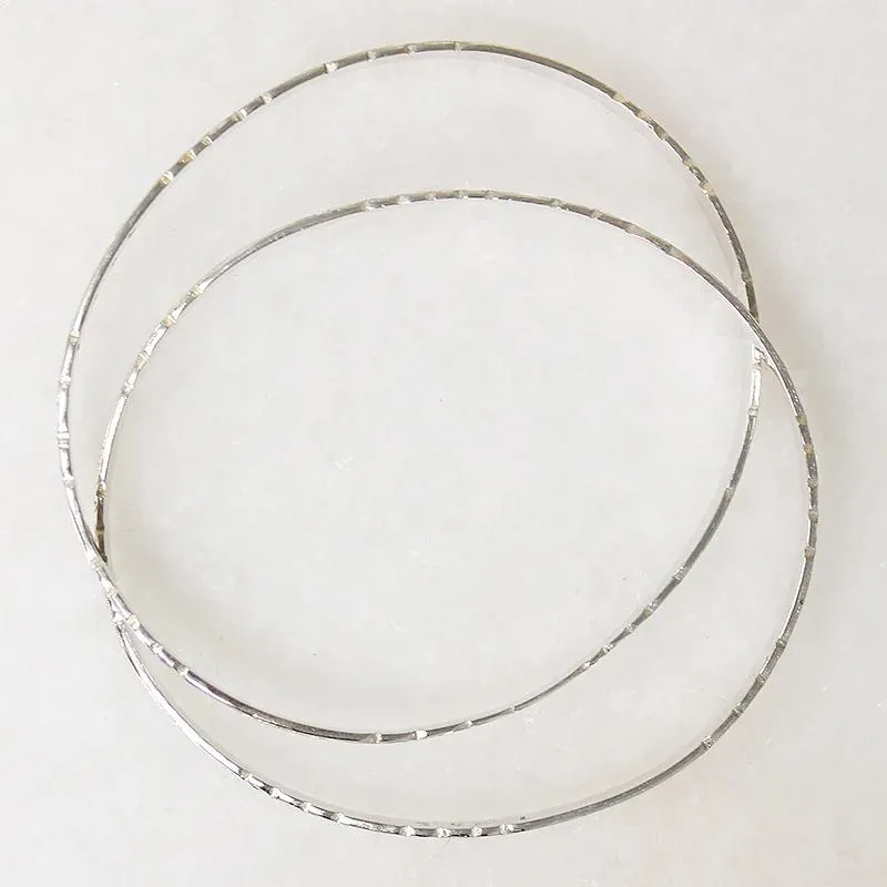 Two Slim Sterling Bangles with Hawaiian Pua Kala Flowers